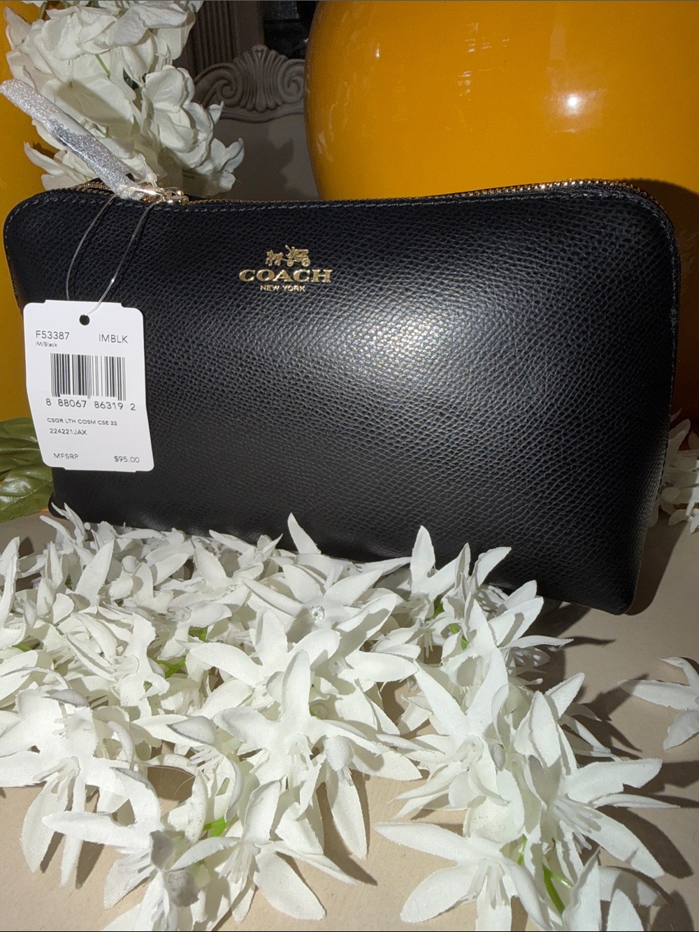 Coach Black Pebbled Leather Toiletry Pouch with Gold Logo